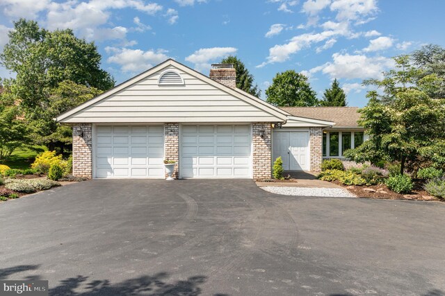 4 Apple Tree Ln, Hummelstown, PA 17036 - ranch-style home featuring asphalt driveway, a chimney, brick siding, and a garage