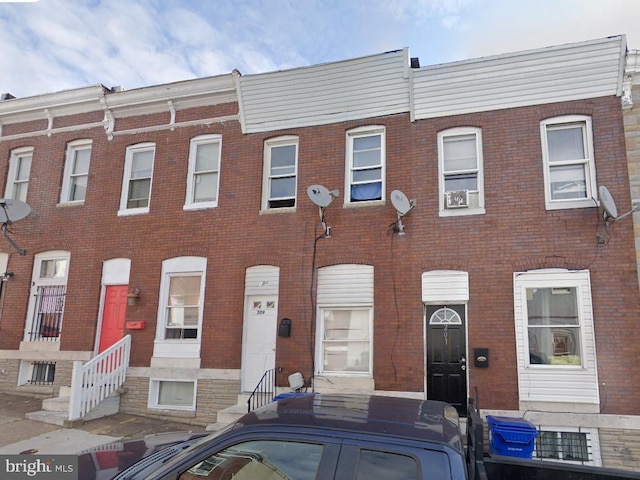 209 Curley St N, Baltimore, MD 21224 - view of property featuring entry steps and brick siding