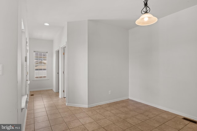 16874 Reef Knot Way, Woodbridge, VA 22191 - empty room with light tile patterned flooring and baseboards