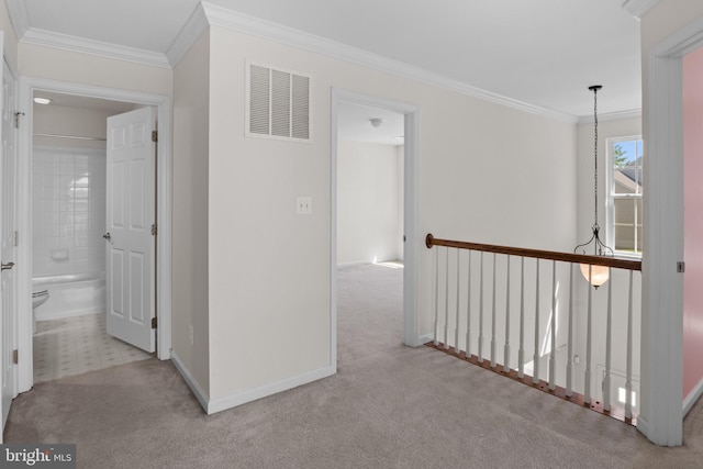 16874 Reef Knot Way, Woodbridge, VA 22191 - hallway with baseboards, crown molding, carpet floors, and an upstairs landing