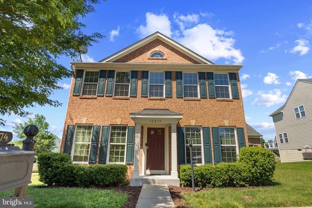 16874 Reef Knot Way, Woodbridge, VA 22191 - view of front of property with brick siding and a front lawn