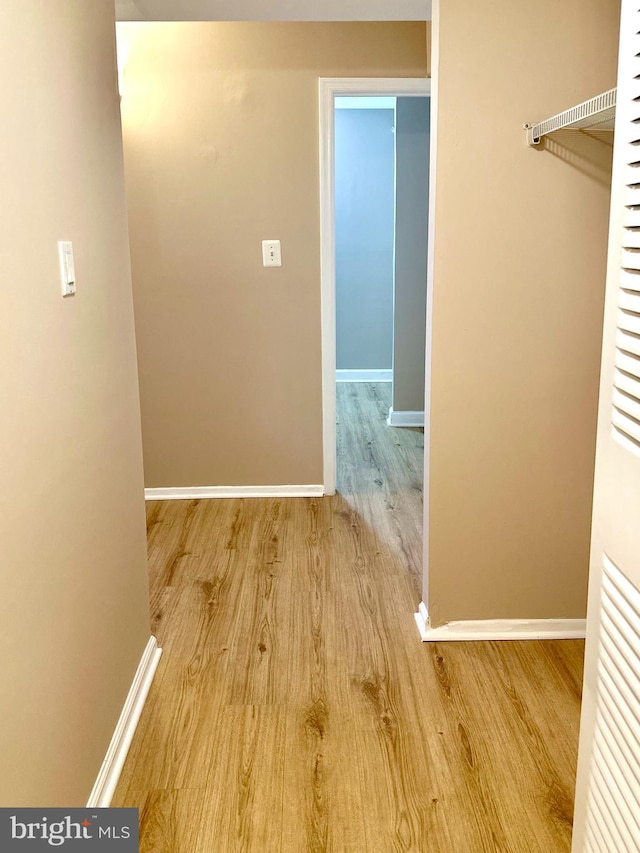 1836 Metzerott Rd Unit 1414, Adelphi, MD 20783 - hall featuring wood finished floors and baseboards