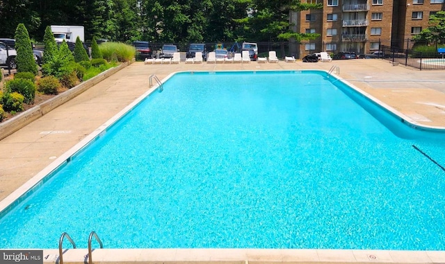 1836 Metzerott Rd Unit 1414, Adelphi, MD 20783 - community pool featuring fence and a patio area