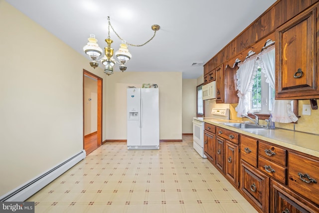 191 Harmony Rd, Gibbstown, NJ 08027 - kitchen featuring white appliances, a baseboard heating unit, a sink, a chandelier, and light floors