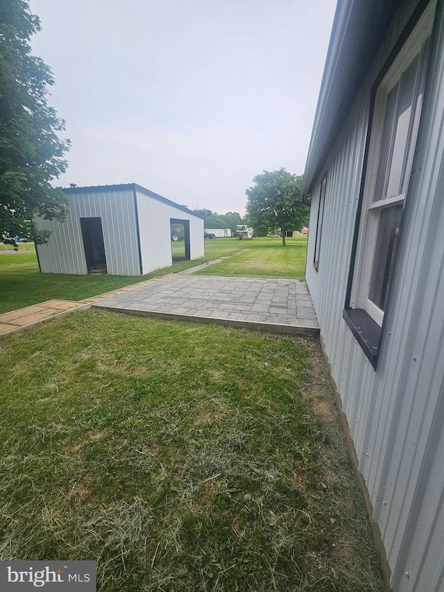 10992 Roxbury Rd, Orrstown, PA 17244 - view of green lawn featuring an outbuilding and a pole building