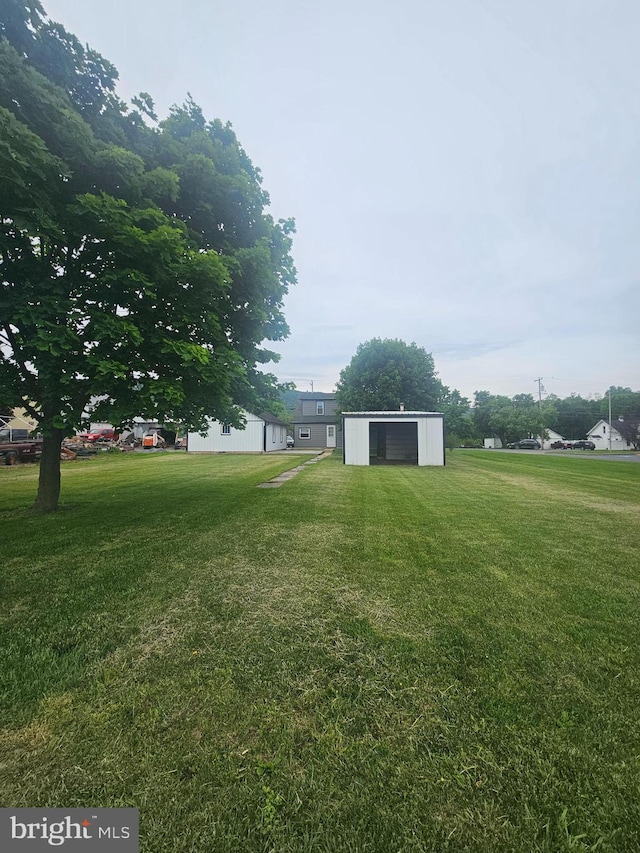 10992 Roxbury Rd, Orrstown, PA 17244 - view of green lawn with an outbuilding and a pole building