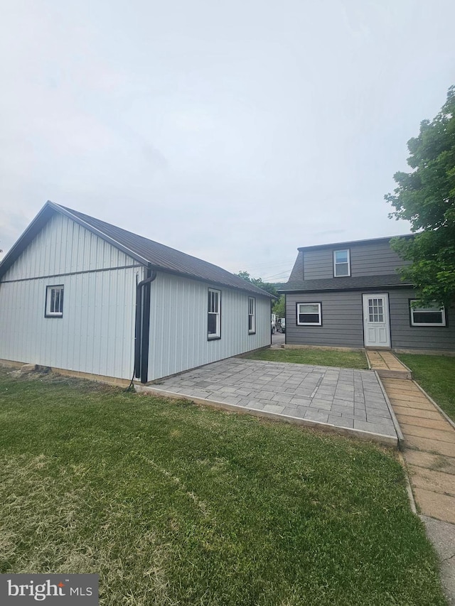 10992 Roxbury Rd, Orrstown, PA 17244 - back of property featuring a yard and a patio area