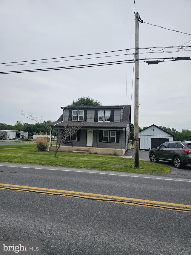 10992 Roxbury Rd, Orrstown, PA 17244 - view of front of property with a garage, a front lawn, and an outdoor structure