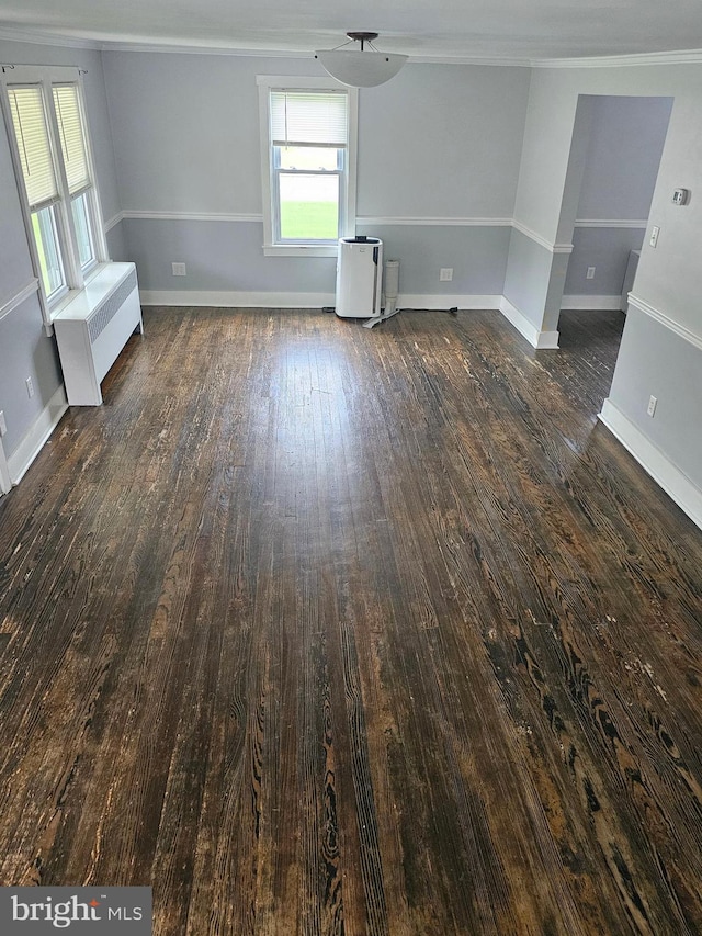 10992 Roxbury Rd, Orrstown, PA 17244 - unfurnished living room featuring ornamental molding, dark wood-type flooring, and baseboards