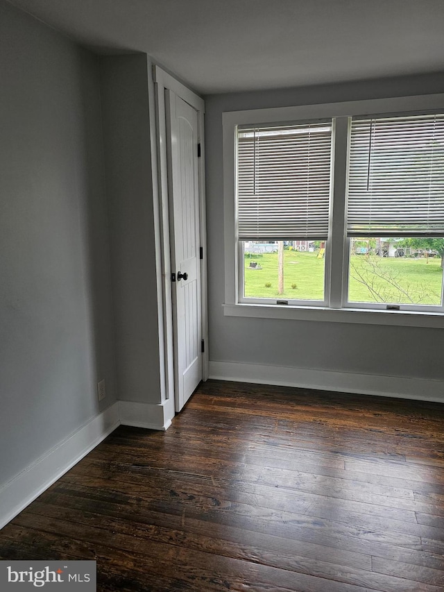 10992 Roxbury Rd, Orrstown, PA 17244 - empty room with dark wood-type flooring and baseboards