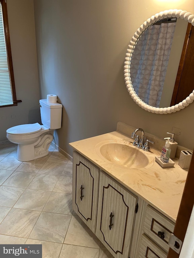 125 E Elm Ave, Lindenwold, NJ 08021 - bathroom featuring vanity, toilet, baseboards, and tile patterned floors