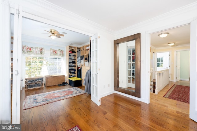 9841 Meadowcroft Ln, Montgomery Village, MD 20886 - entrance foyer featuring crown molding, wood finished floors, baseboards, and a ceiling fan