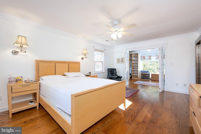 9841 Meadowcroft Ln, Montgomery Village, MD 20886 - bedroom with multiple windows, crown molding, wood finished floors, and baseboards
