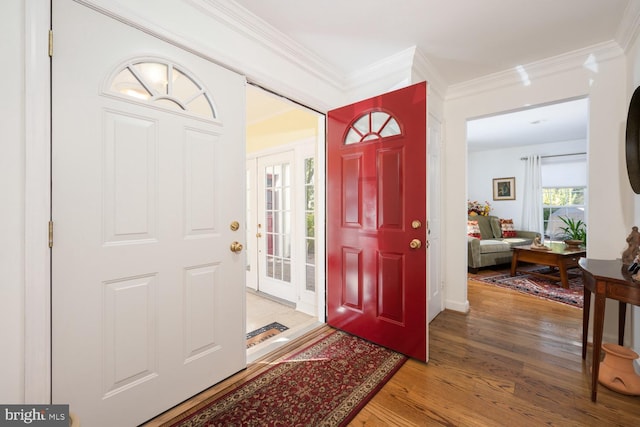 9841 Meadowcroft Ln, Montgomery Village, MD 20886 - foyer with light wood finished floors and crown molding