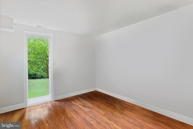 10816 Green Mountain Cir Unit 19-10, Columbia, MD 21044 - spare room with baseboards and wood finished floors