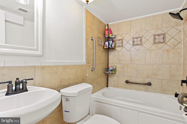 10816 Green Mountain Cir Unit 19-10, Columbia, MD 21044 - full bathroom featuring a sink, shower / bath combination, tile walls, and toilet