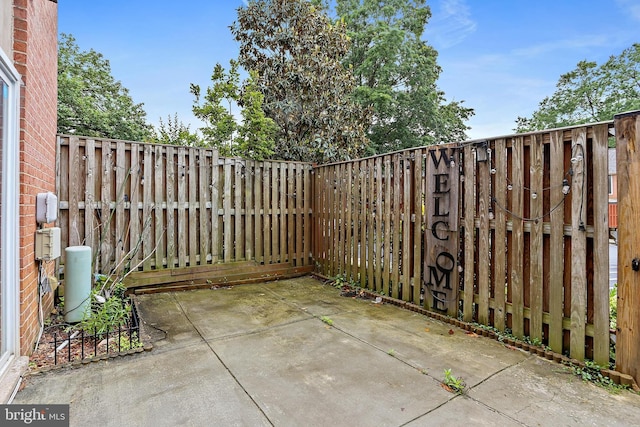 10816 Green Mountain Cir Unit 19-10, Columbia, MD 21044 - fenced backyard featuring a patio area