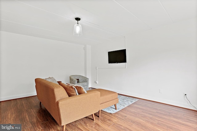 10816 Green Mountain Cir Unit 19-10, Columbia, MD 21044 - living area featuring wood finished floors and baseboards