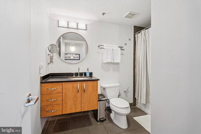 200 Lincoln Ave Unit 304, Phoenixville, PA 19460 - full bathroom featuring toilet, vanity, tile patterned flooring, a shower with shower curtain, and baseboards