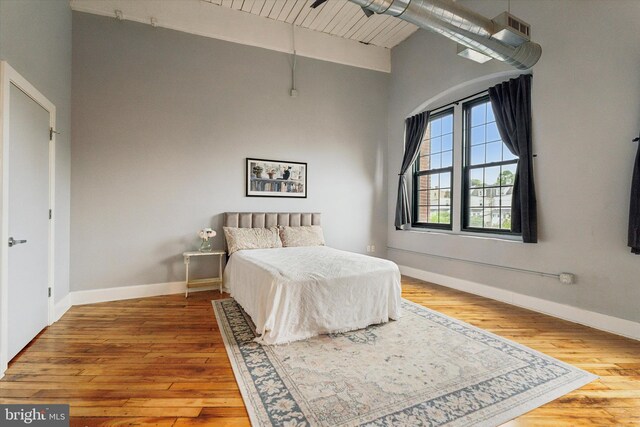 200 Lincoln Ave Unit 304, Phoenixville, PA 19460 - bedroom with wood finished floors, baseboards, high vaulted ceiling, and wood ceiling with exposed beams