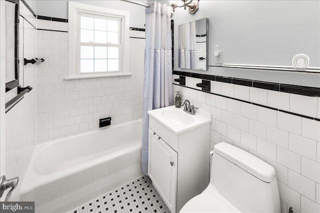 101 Flower, Mount Airy, MD 21771 - full bathroom featuring vanity, tile walls, shower / bath combination with curtain, and toilet