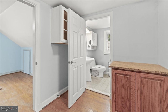101 Flower, Mount Airy, MD 21771 - bathroom with wood finished floors, toilet, and baseboards