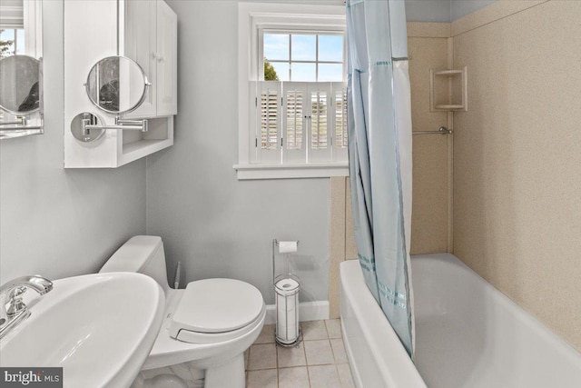 101 Flower, Mount Airy, MD 21771 - bathroom with a sink, shower / bath combo with shower curtain, tile patterned floors, and toilet