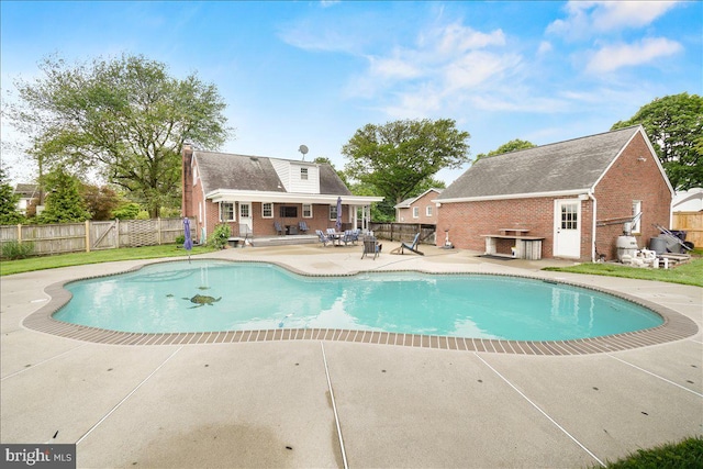 101 Flower, Mount Airy, MD 21771 - view of pool with a patio area, a fenced backyard, and an outdoor structure