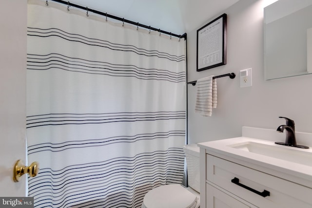 3663 Trinity, Alexandria, VA 22304 - bathroom with toilet, vanity, and a shower with shower curtain