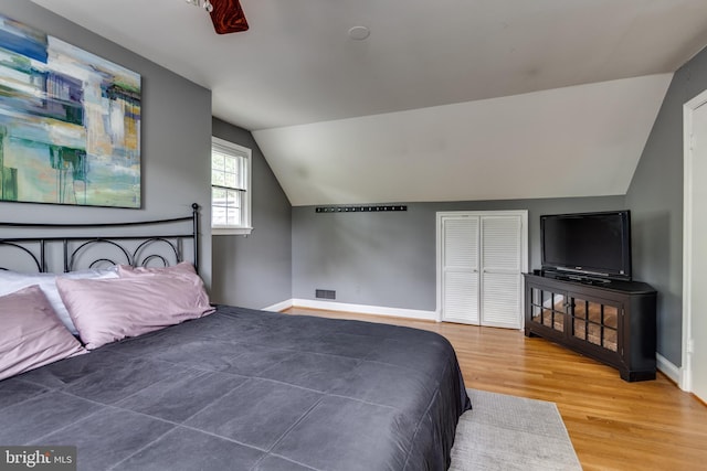 3663 Trinity, Alexandria, VA 22304 - bedroom featuring lofted ceiling, baseboards, wood finished floors, and a closet