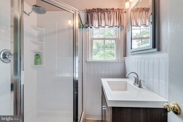 3663 Trinity, Alexandria, VA 22304 - bathroom featuring a shower stall, vanity, and a wainscoted wall