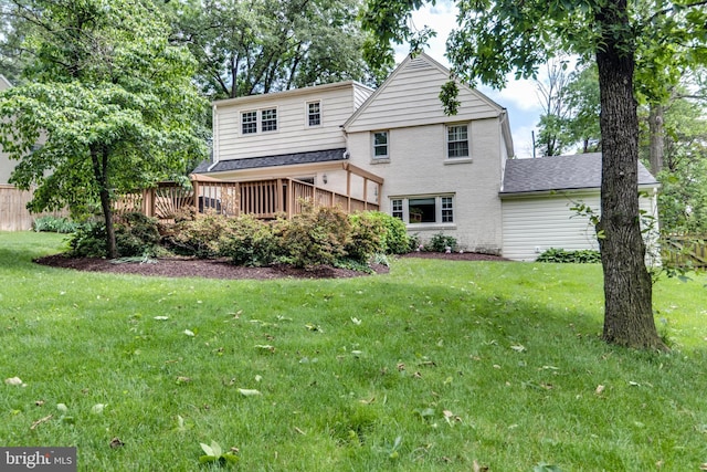 3663 Trinity, Alexandria, VA 22304 - rear view of house featuring brick siding, a wooden deck, and a shingled roof