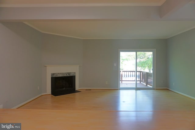 3506 Split Rail Ln, Ellicott City, MD 21042 - unfurnished living room featuring wood finished floors, a premium fireplace, baseboards, and ornamental molding