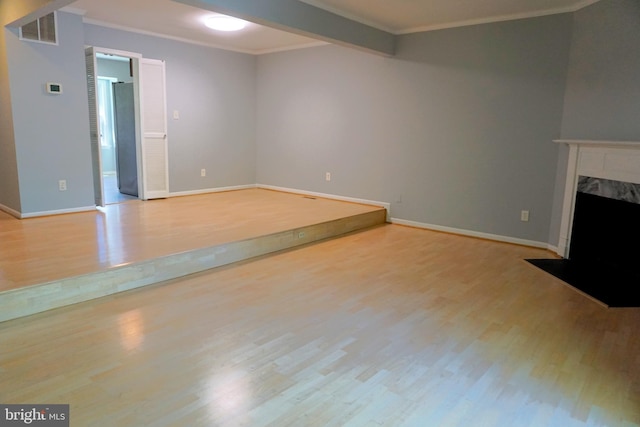 3506 Split Rail Ln, Ellicott City, MD 21042 - unfurnished living room with wood finished floors, ornamental molding, baseboards, and a premium fireplace