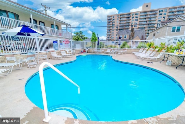 9415 Pacific Ave Unit 43, Margate City, NJ 08402 - community pool featuring fence and a patio