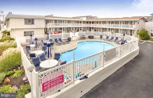 9415 Pacific Ave Unit 43, Margate City, NJ 08402 - community pool with fence and a patio area