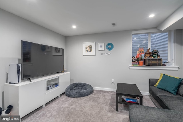 carpeted living room with baseboards and recessed lighting