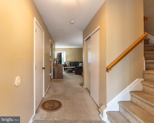 17 Pilgrim Ct, Ewing, NJ 08628 - hallway featuring stairway and light carpet