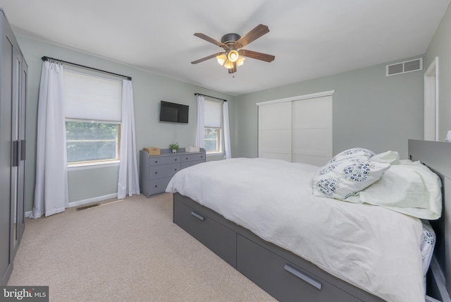 130 Brent Ct, Thorofare, NJ 08086 - bedroom with a closet, light carpet, baseboards, and ceiling fan