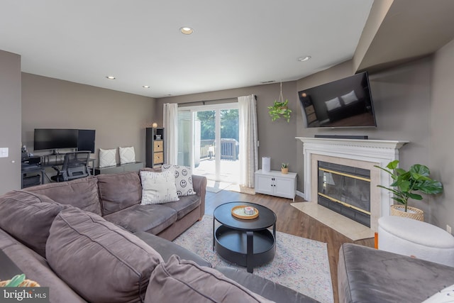 130 Brent Ct, Thorofare, NJ 08086 - living area with wood finished floors, a high end fireplace, and recessed lighting