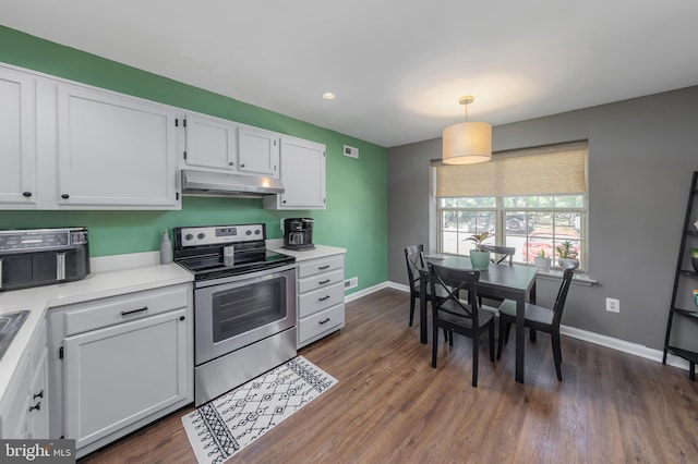 130 Brent Ct, Thorofare, NJ 08086 - kitchen with electric stove, under cabinet range hood, white cabinetry, dark wood finished floors, and baseboards