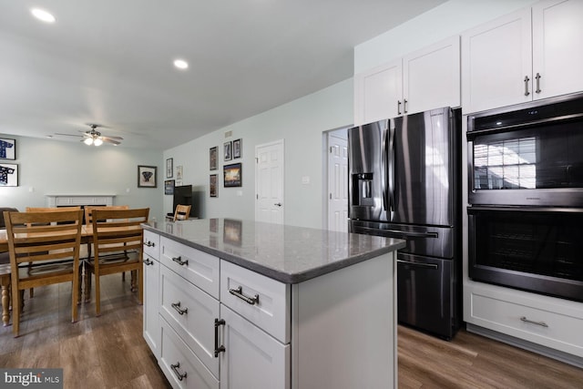 1839 Disney Estates Cir, Severn, MD 21144 - kitchen with fridge with ice dispenser, double wall oven, dark wood-type flooring, a ceiling fan, and recessed lighting