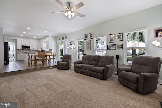 1839 Disney Estates Cir, Severn, MD 21144 - living room with light carpet, a ceiling fan, healthy amount of natural light, and recessed lighting