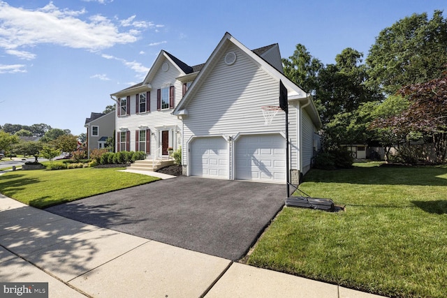 1839 Disney Estates Cir, Severn, MD 21144 - view of front facade with driveway and a front yard