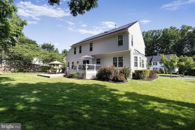 1839 Disney Estates Cir, Severn, MD 21144 - rear view of property with a patio and a lawn