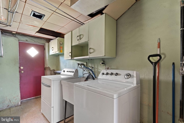 6602 Revere St, Philadelphia, PA 19149 - laundry area featuring cabinet space, separate washer and dryer, and baseboards