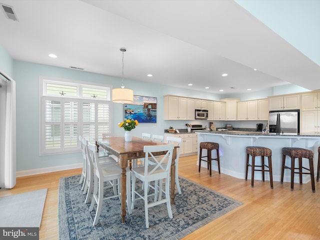 32561 Heron Cir Unit 13, Bethany Beach, DE 19930 - dining space with light wood-style floors, baseboards, and recessed lighting
