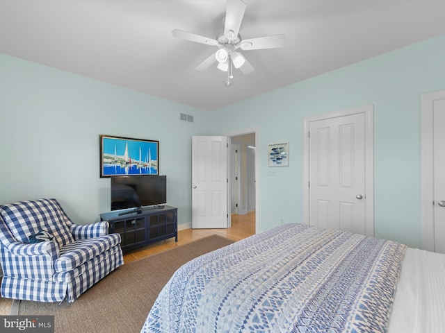 32561 Heron Cir Unit 13, Bethany Beach, DE 19930 - bedroom featuring wood finished floors and ceiling fan