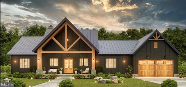 modern farmhouse style home featuring board and batten siding, covered porch, driveway, a chimney, and a garage