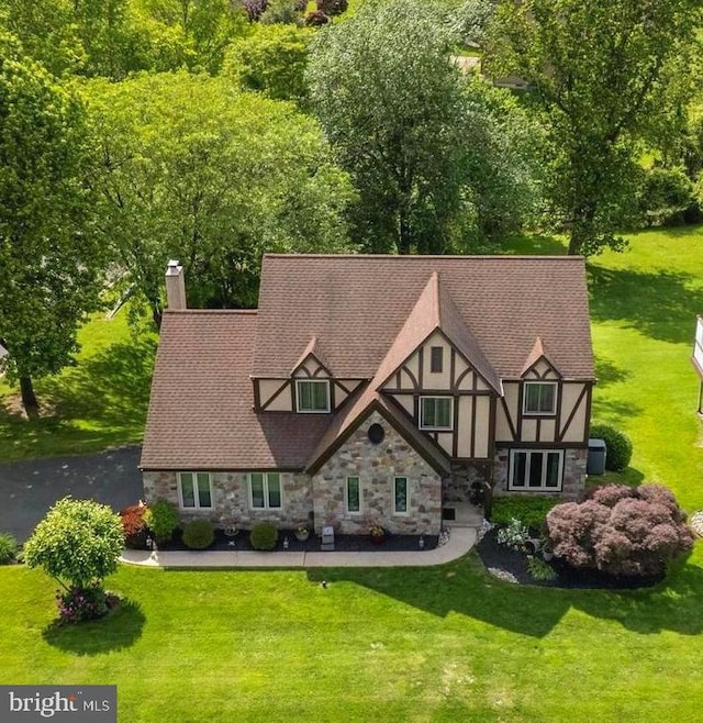 500 Newport Cir, Langhorne, PA 19053 - view of front of home with stone siding, a chimney, and a front lawn